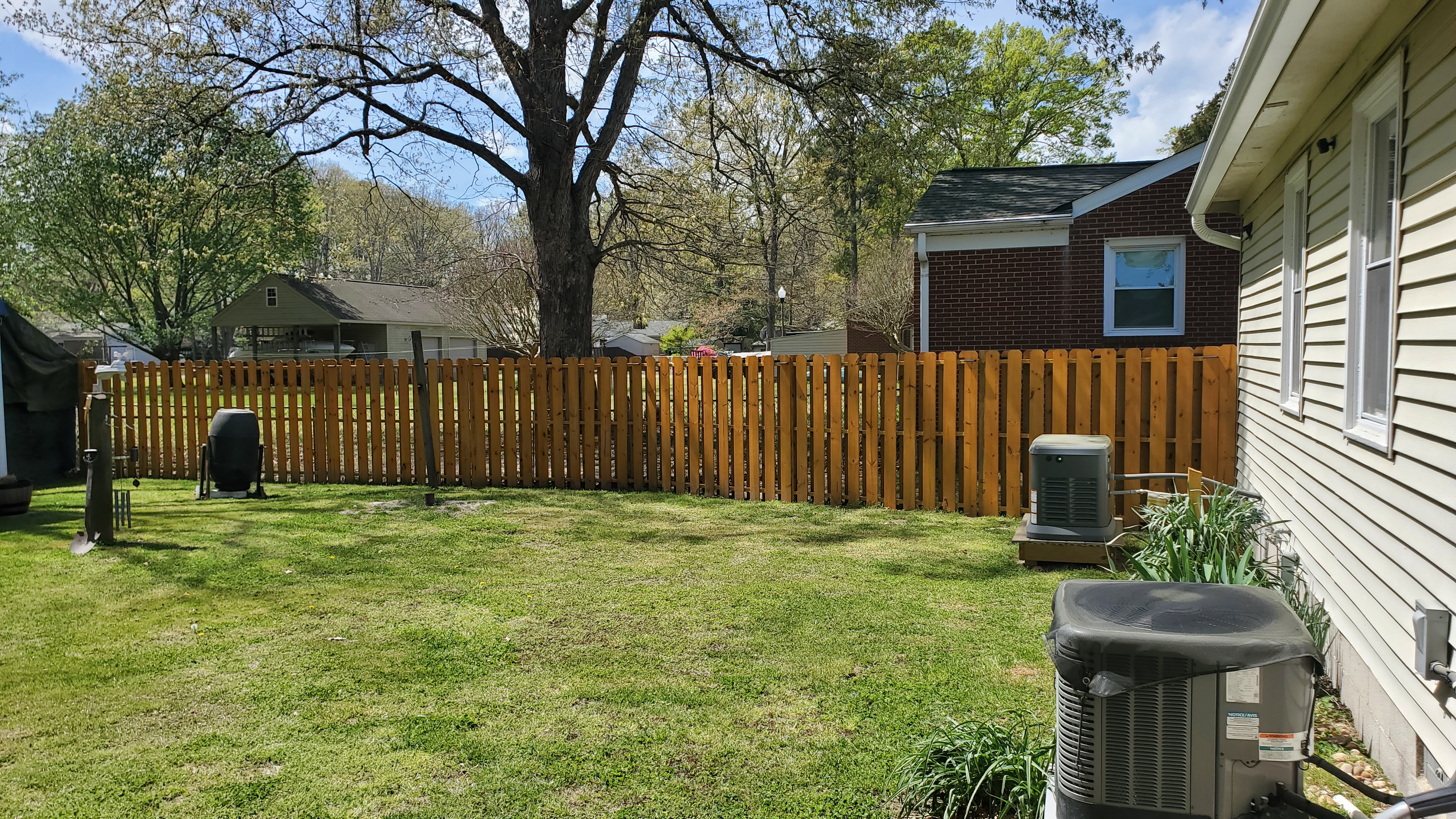 Wood fence — panel and post installation